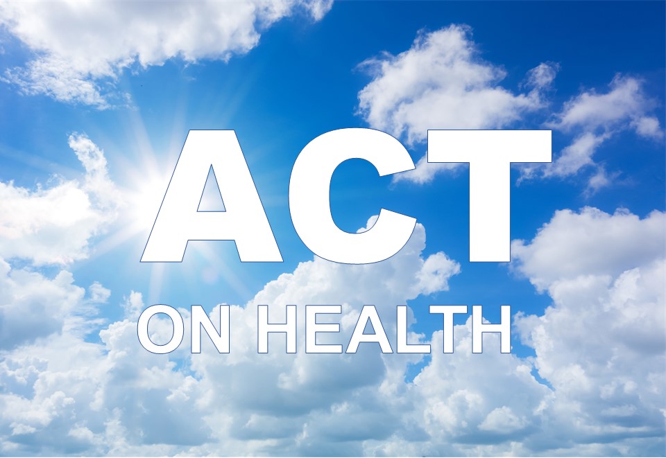 Cloudy blue sky with the words act on health on top