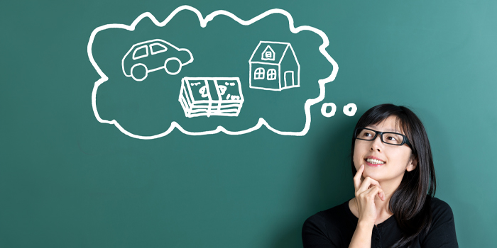 Woman with thought bubble of financial goals
