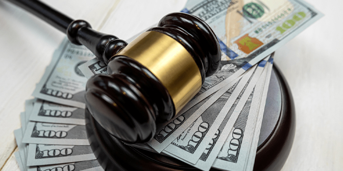 Gavel and hundred dollar bills