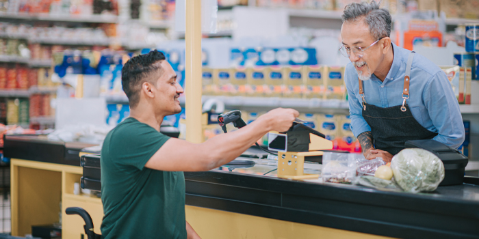 Man taking advantage of veteran discount at hardware store