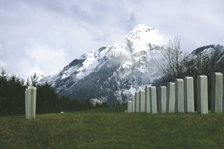 The remote Sitka National Cemetery is located half a mile east of the center of town and is dominated by the natural beauty of the mountains and waters of Sitka Bay. The only access to Sitka is by air, marine highway or weekly ferry from Seattle, WA.