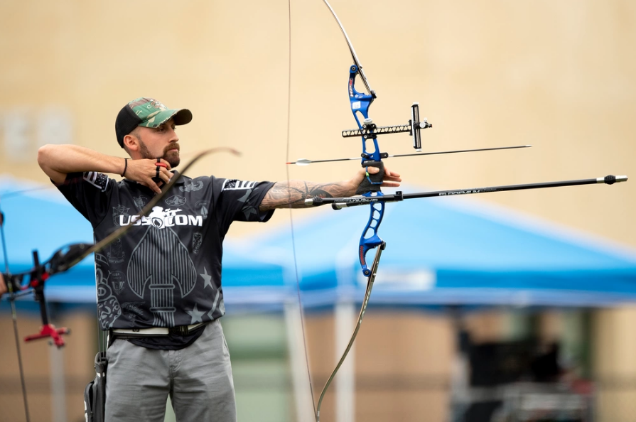 Army Soldier wins bronze for Special Operations Command in standing recurve bow archery in the 2023 DoD Warrior Games at Naval Base Coronado in San Diego, Calif. June 9, 2023. (DoD photo by EJ Hersom)